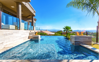 Universal Mini Pebble Jewels for Pools White Pool with water and fire features and disappearing edge