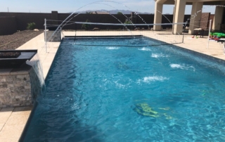 Universal Mini Pebble Jewels For Pools finish Pool with net, water feature and cabana