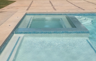 Finish Sparkle Quartz White Pool spa and ledge with teal quartz blue tile trim