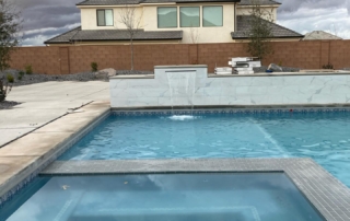 Sparkle Quartz Lakeside spa and pool with tile trim on spa ledge baja ledge