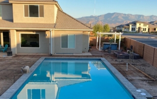 Sparkle Quartz White pool with blue tile detail and pool cover