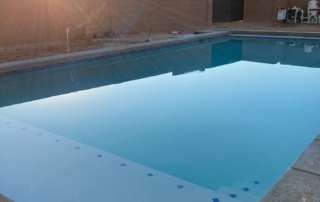 Sparkle Quartz White pool with blue tile detail with baja ledge and steps 2