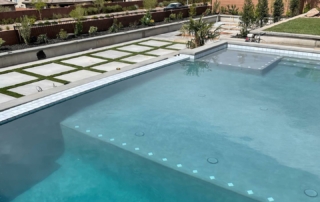 Finest Finish Sparkle Quartz French Grey pool with baja shelf