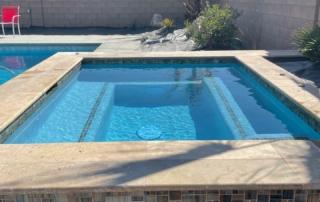 Finest Finish Sparkle Quartz Pacific pool with spa in backgrounFinest Finish Sparkle Quartz Lakeside square spa
