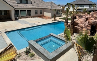 Finest Finish Sparkle Quartz Pacific pool with spa in backgrounFinest Finish Sparkle Quartz Pacific pool with spa