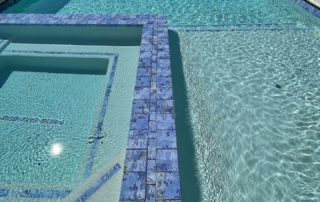 Finest Finish Sparkle Quartz White pool and spa with turquoise coFinest Finish Sparkle Quartz White pool and spa with tile detail