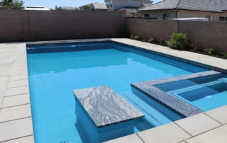 Finest Finish Sparkle Quartz Lakeside Pool spa, in-water bench and table