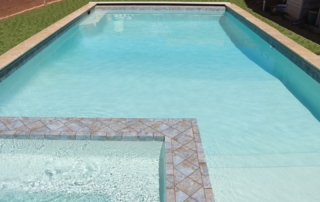 Finest Finish Sparkle Quartz White spa with tile detail and pool