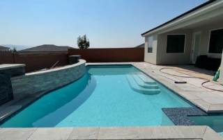 Finest Finish Sparkle Quartz White with rounded steps and stone wall