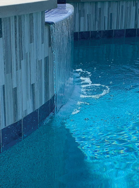 Radiant Fusion pool with waterfall and tiles - laguna